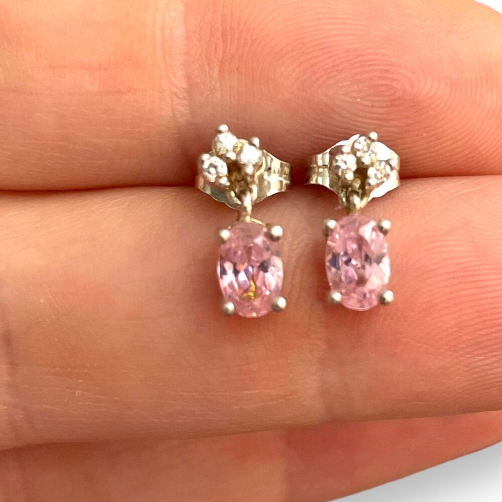 Elegant Pink sapphire stone with three white Topaz stones on 925 Sterling Silver